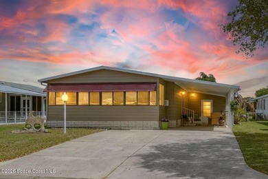 Come see this magnificently updated 2BR/2BA home in the heart of on Barefoot Bay Golf Course in Florida - for sale on GolfHomes.com, golf home, golf lot