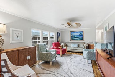 Come see this magnificently updated 2BR/2BA home in the heart of on Barefoot Bay Golf Course in Florida - for sale on GolfHomes.com, golf home, golf lot