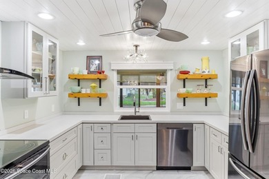 Come see this magnificently updated 2BR/2BA home in the heart of on Barefoot Bay Golf Course in Florida - for sale on GolfHomes.com, golf home, golf lot