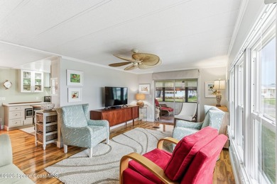 Come see this magnificently updated 2BR/2BA home in the heart of on Barefoot Bay Golf Course in Florida - for sale on GolfHomes.com, golf home, golf lot