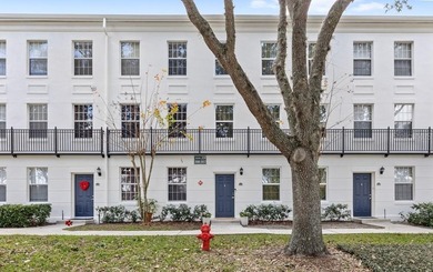 Nestled on one of Celebration's picturesque, tree-lined streets on Celebration Golf Club in Florida - for sale on GolfHomes.com, golf home, golf lot