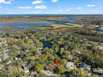 ALL BRICK BEAUTY situated on one of the largest lots in Pablo on Queens Harbour Yacht and Country Club in Florida - for sale on GolfHomes.com, golf home, golf lot