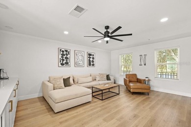 Nestled on one of Celebration's picturesque, tree-lined streets on Celebration Golf Club in Florida - for sale on GolfHomes.com, golf home, golf lot