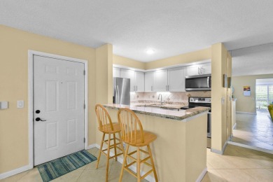 THE LOWEST PRICED GROUND FLOOR UNIT IN DUNBAR WOODS! UPDATED AND on PGA National Golf Club in Florida - for sale on GolfHomes.com, golf home, golf lot