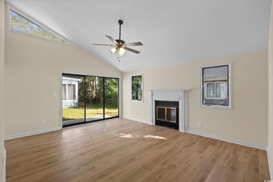 Beautifully updated 2-bedroom, 2-bath home in the desirable on Island Green Golf Club in South Carolina - for sale on GolfHomes.com, golf home, golf lot