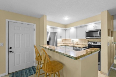 THE LOWEST PRICED GROUND FLOOR UNIT IN DUNBAR WOODS! UPDATED AND on PGA National Golf Club in Florida - for sale on GolfHomes.com, golf home, golf lot