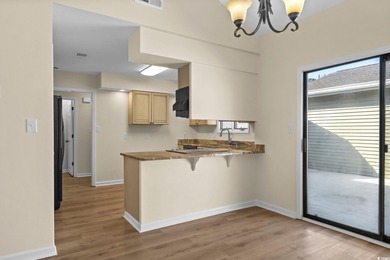 Beautifully updated 2-bedroom, 2-bath home in the desirable on Island Green Golf Club in South Carolina - for sale on GolfHomes.com, golf home, golf lot