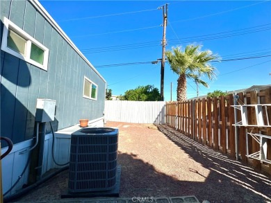 This delightful double wide mobile home is nestled in the on The Club At Shenandoah Springs in California - for sale on GolfHomes.com, golf home, golf lot