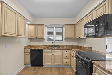 Beautifully updated 2-bedroom, 2-bath home in the desirable on Island Green Golf Club in South Carolina - for sale on GolfHomes.com, golf home, golf lot