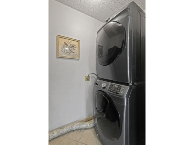 THE LOWEST PRICED GROUND FLOOR UNIT IN DUNBAR WOODS! UPDATED AND on PGA National Golf Club in Florida - for sale on GolfHomes.com, golf home, golf lot