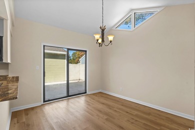 Beautifully updated 2-bedroom, 2-bath home in the desirable on Island Green Golf Club in South Carolina - for sale on GolfHomes.com, golf home, golf lot