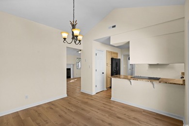 Beautifully updated 2-bedroom, 2-bath home in the desirable on Island Green Golf Club in South Carolina - for sale on GolfHomes.com, golf home, golf lot