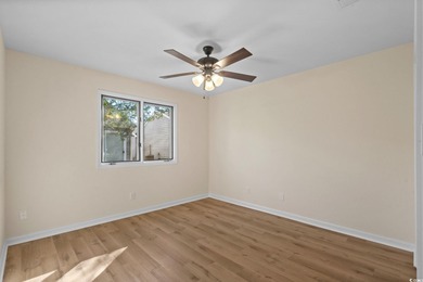 Beautifully updated 2-bedroom, 2-bath home in the desirable on Island Green Golf Club in South Carolina - for sale on GolfHomes.com, golf home, golf lot