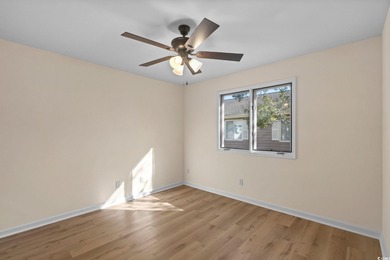 Beautifully updated 2-bedroom, 2-bath home in the desirable on Island Green Golf Club in South Carolina - for sale on GolfHomes.com, golf home, golf lot