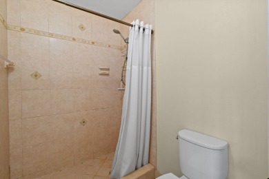 THE LOWEST PRICED GROUND FLOOR UNIT IN DUNBAR WOODS! UPDATED AND on PGA National Golf Club in Florida - for sale on GolfHomes.com, golf home, golf lot