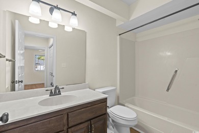 Beautifully updated 2-bedroom, 2-bath home in the desirable on Island Green Golf Club in South Carolina - for sale on GolfHomes.com, golf home, golf lot