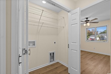 Beautifully updated 2-bedroom, 2-bath home in the desirable on Island Green Golf Club in South Carolina - for sale on GolfHomes.com, golf home, golf lot