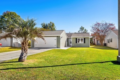 Beautifully updated 2-bedroom, 2-bath home in the desirable on Island Green Golf Club in South Carolina - for sale on GolfHomes.com, golf home, golf lot