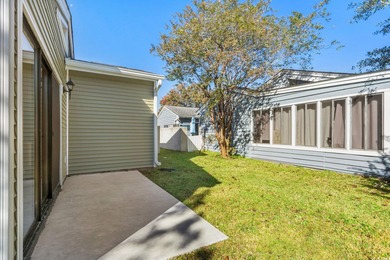 Beautifully updated 2-bedroom, 2-bath home in the desirable on Island Green Golf Club in South Carolina - for sale on GolfHomes.com, golf home, golf lot