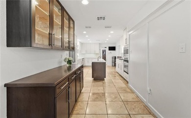 This stunning residence in Corpus Christi Country Club offers 4 on Corpus Christi Country Club Golf Course in Texas - for sale on GolfHomes.com, golf home, golf lot