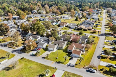 Beautifully updated 2-bedroom, 2-bath home in the desirable on Island Green Golf Club in South Carolina - for sale on GolfHomes.com, golf home, golf lot