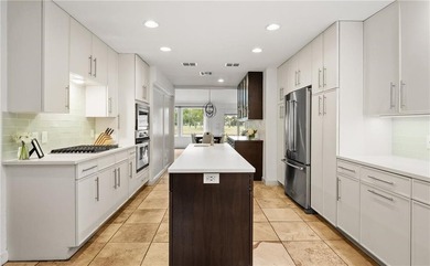 This stunning residence in Corpus Christi Country Club offers 4 on Corpus Christi Country Club Golf Course in Texas - for sale on GolfHomes.com, golf home, golf lot