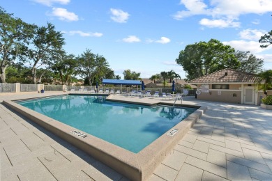 THE LOWEST PRICED GROUND FLOOR UNIT IN DUNBAR WOODS! UPDATED AND on PGA National Golf Club in Florida - for sale on GolfHomes.com, golf home, golf lot