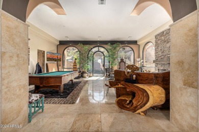 Discover this awe-inspiring, custom Pinnacle Canyon home sitting on The Estancia Club in Arizona - for sale on GolfHomes.com, golf home, golf lot