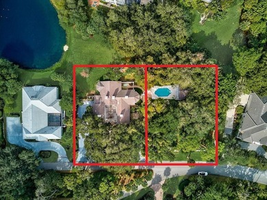 **STUNNING ARCHITECTURAL ESTATE in the coveted OAKS BAYSIDE on The Oaks Club in Florida - for sale on GolfHomes.com, golf home, golf lot