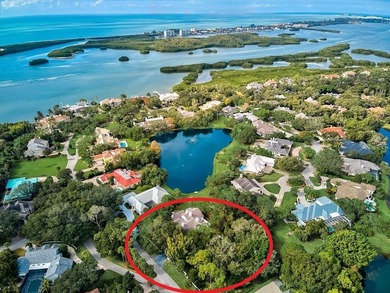 **STUNNING ARCHITECTURAL ESTATE in the coveted OAKS BAYSIDE on The Oaks Club in Florida - for sale on GolfHomes.com, golf home, golf lot
