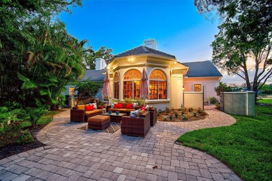 **STUNNING ARCHITECTURAL ESTATE in the coveted OAKS BAYSIDE on The Oaks Club in Florida - for sale on GolfHomes.com, golf home, golf lot