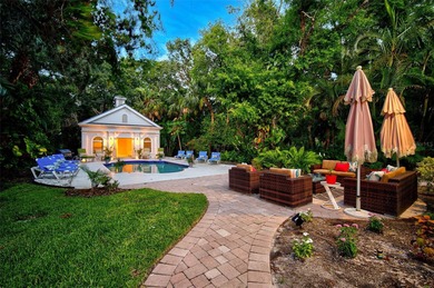 **STUNNING ARCHITECTURAL ESTATE in the coveted OAKS BAYSIDE on The Oaks Club in Florida - for sale on GolfHomes.com, golf home, golf lot