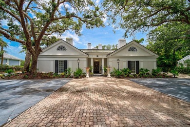 **STUNNING ARCHITECTURAL ESTATE in the coveted OAKS BAYSIDE on The Oaks Club in Florida - for sale on GolfHomes.com, golf home, golf lot