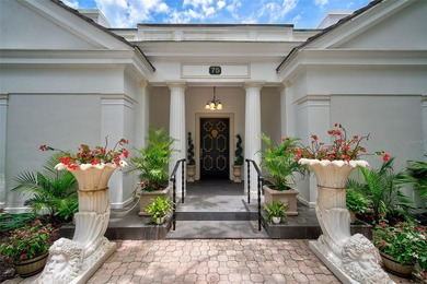 **STUNNING ARCHITECTURAL ESTATE in the coveted OAKS BAYSIDE on The Oaks Club in Florida - for sale on GolfHomes.com, golf home, golf lot