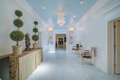 **STUNNING ARCHITECTURAL ESTATE in the coveted OAKS BAYSIDE on The Oaks Club in Florida - for sale on GolfHomes.com, golf home, golf lot