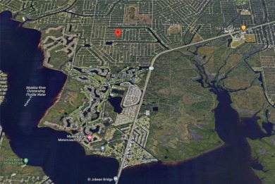 Great property for sale in Port Charlotte, that has 80 ft of on Riverwood Golf Club in Florida - for sale on GolfHomes.com, golf home, golf lot