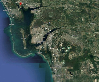 Great property for sale in Port Charlotte, that has 80 ft of on Riverwood Golf Club in Florida - for sale on GolfHomes.com, golf home, golf lot