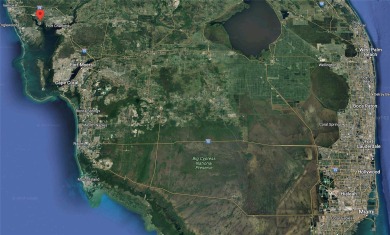 Great property for sale in Port Charlotte, that has 80 ft of on Riverwood Golf Club in Florida - for sale on GolfHomes.com, golf home, golf lot