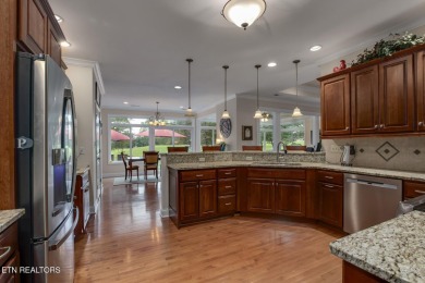 Location, location, location! This beautiful custom-built home on Toqua Golf Course - Loudon County in Tennessee - for sale on GolfHomes.com, golf home, golf lot