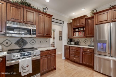 Location, location, location! This beautiful custom-built home on Toqua Golf Course - Loudon County in Tennessee - for sale on GolfHomes.com, golf home, golf lot