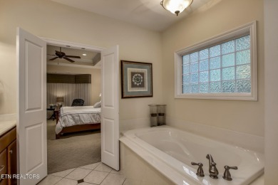 Location, location, location! This beautiful custom-built home on Toqua Golf Course - Loudon County in Tennessee - for sale on GolfHomes.com, golf home, golf lot