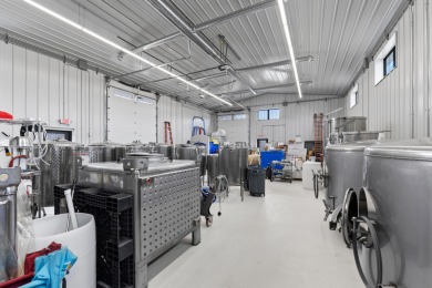 Nestled in the heart of Maine's picturesque countryside on Springbrook Golf Club in Maine - for sale on GolfHomes.com, golf home, golf lot