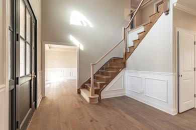 Welcome to this elegant 4-bedroom, 4.2-bath home, situated on a on Royal Melbourne in Illinois - for sale on GolfHomes.com, golf home, golf lot