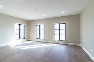 Welcome to this elegant 4-bedroom, 4.2-bath home, situated on a on Royal Melbourne in Illinois - for sale on GolfHomes.com, golf home, golf lot