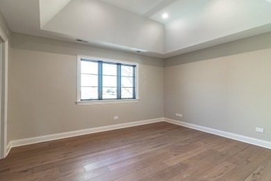 Welcome to this elegant 4-bedroom, 4.2-bath home, situated on a on Royal Melbourne in Illinois - for sale on GolfHomes.com, golf home, golf lot