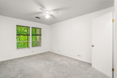 Main level includes living/dining room, kitchen and half bath on DeSoto Golf Course in Arkansas - for sale on GolfHomes.com, golf home, golf lot