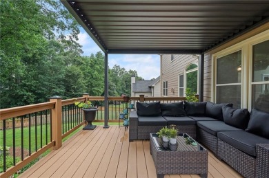 Welcome to this beautifully updated brick-front home offering a on Hamilton Mill Golf Club in Georgia - for sale on GolfHomes.com, golf home, golf lot