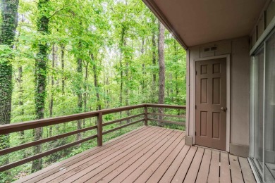 Main level includes living/dining room, kitchen and half bath on DeSoto Golf Course in Arkansas - for sale on GolfHomes.com, golf home, golf lot