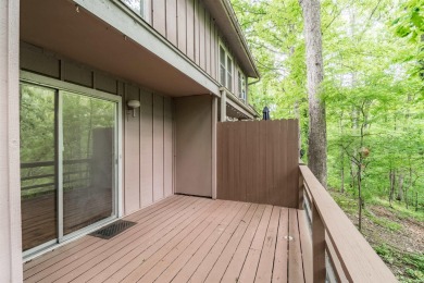 Main level includes living/dining room, kitchen and half bath on DeSoto Golf Course in Arkansas - for sale on GolfHomes.com, golf home, golf lot