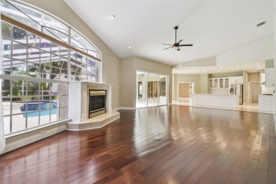 Stunning 4-bedroom, 3-bath pool home with spa on a serene pond on Crescent Oaks Country Club in Florida - for sale on GolfHomes.com, golf home, golf lot